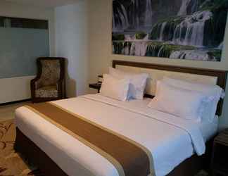 ห้องนอน 2 Travellers Hotel Phinisi