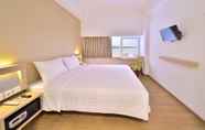 Kamar Tidur 6 Whiz Prime Hotel Megamas Manado