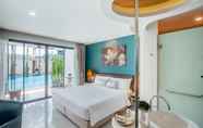 Kamar Tidur 4 The Pago Design Hotel Phuket