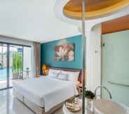 Kamar Tidur 4 The Pago Design Hotel Phuket