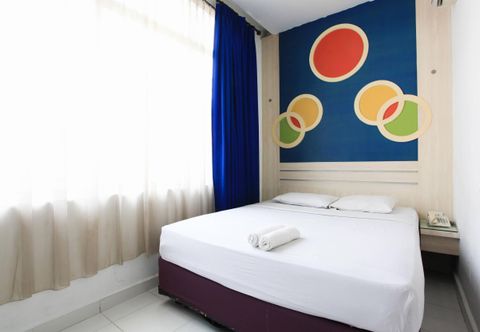 침실 Wisma Rainbow Pekanbaru