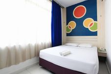 침실 Wisma Rainbow Pekanbaru
