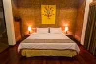 ห้องนอน Kampoeng Padi Resort