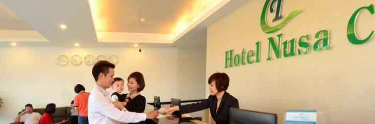 Lobi Hotel Nusa CT by Holmes Hotel