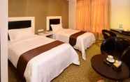 Kamar Tidur 4 Hotel Nusa CT by Holmes Hotel