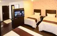 Kamar Tidur 5 Hotel Nusa CT by Holmes Hotel