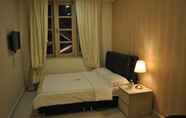 Kamar Tidur 4 Jayleen Clarke Quay Hotel