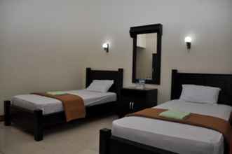 Kamar Tidur 4 Batu Layar Hotel