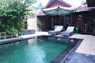 สระว่ายน้ำ Drupadi Bungalows