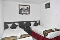 Bedroom Grand Malaka Ethical Hotel