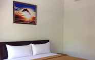 ห้องนอน 4 Puri Kelapa Guest House