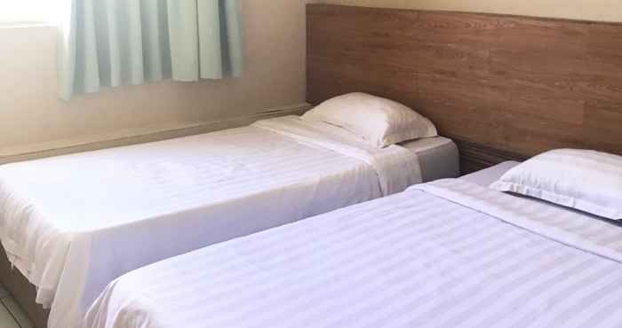 Kamar Tidur Iskandar Sinsuran Guesthouse