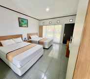 Bedroom 5 Grand Tirta Hotel