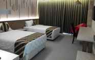 Bedroom 2 Grand Laguna Hotel & Villa Solo