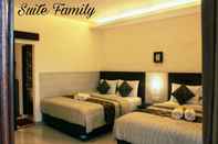 Kamar Tidur The Surya Deluxe Homestay