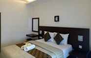 Kamar Tidur 4 The Surya Deluxe Homestay