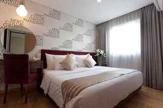 Bedroom 4 MG Suites Hotel Semarang