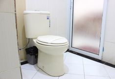 In-room Bathroom 6 Ririn Hotel