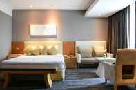 Kamar Tidur Grand Richmond Stylish Convention Hotel (SHA Plus)