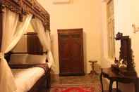 Bedroom nDalem Natan Royal Heritage