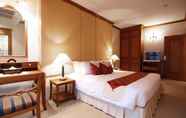 Kamar Tidur 7 Grand Diamond Suites Hotel