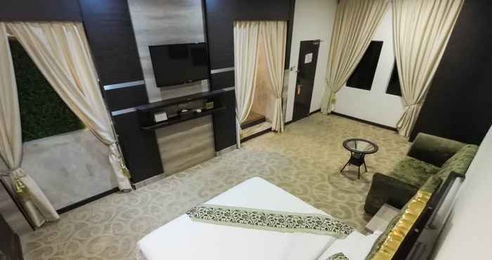 ห้องนอน Baguss Hotel And Serviced Apartment