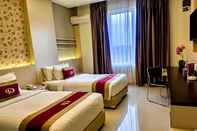 ห้องนอน Grand Parama Hotel