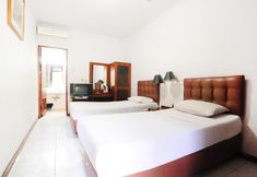 Kamar Tidur 6 De'Qur Hotel Bandung