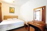 Bedroom De'Qur Hotel Bandung