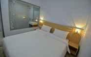 Kamar Tidur 7 T-One Hotel