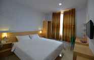 Kamar Tidur 3 T-One Hotel