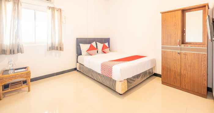 Kamar Tidur OYO 863 Tenacity Guest House Syariah