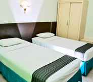 Bedroom 7 Zamrud Hotel & Convention
