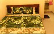 Kamar Tidur 7 Santoso Homestay