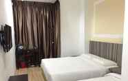 Kamar Tidur 3 Sun Inns Hotel Ayer Keroh