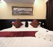 Phòng ngủ 4 J Suites Hotel