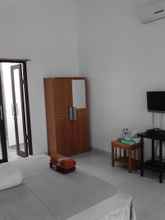 Kamar Tidur 4 Dermaga Kelayang Cottages