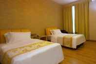 Kamar Tidur Hotel Shiki by Holmes Hotel