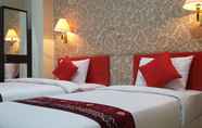 Kamar Tidur 5 Queen City Hotel Banjarmasin (A HARBOUR SIDE HOTEL)