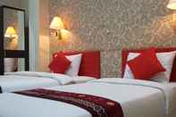 ห้องนอน Queen City Hotel Banjarmasin (A HARBOUR SIDE HOTEL)