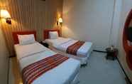 Kamar Tidur 7 Queen City Hotel Banjarmasin (A HARBOUR SIDE HOTEL)