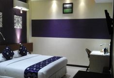 Phòng ngủ 4 Queen City Hotel Banjarmasin (A HARBOUR SIDE HOTEL)