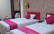 Bedroom 6 Queen City Hotel Banjarmasin (A HARBOUR SIDE HOTEL)