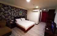 Bedroom 4 D'Borneo Hotel