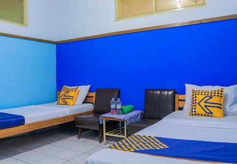 Bedroom SPOT ON 1708 Hotel Budi Famili 1 Syariah
