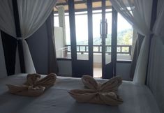 Bedroom 7 Puri Sunset Homestay