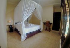 寝室 2 Puri Sunset Homestay 