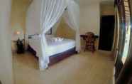 Kamar Tidur 2 Puri Sunset Homestay 