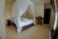 Bedroom Puri Sunset Homestay 