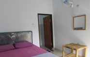 Kamar Tidur 4 Family Garden Homestay